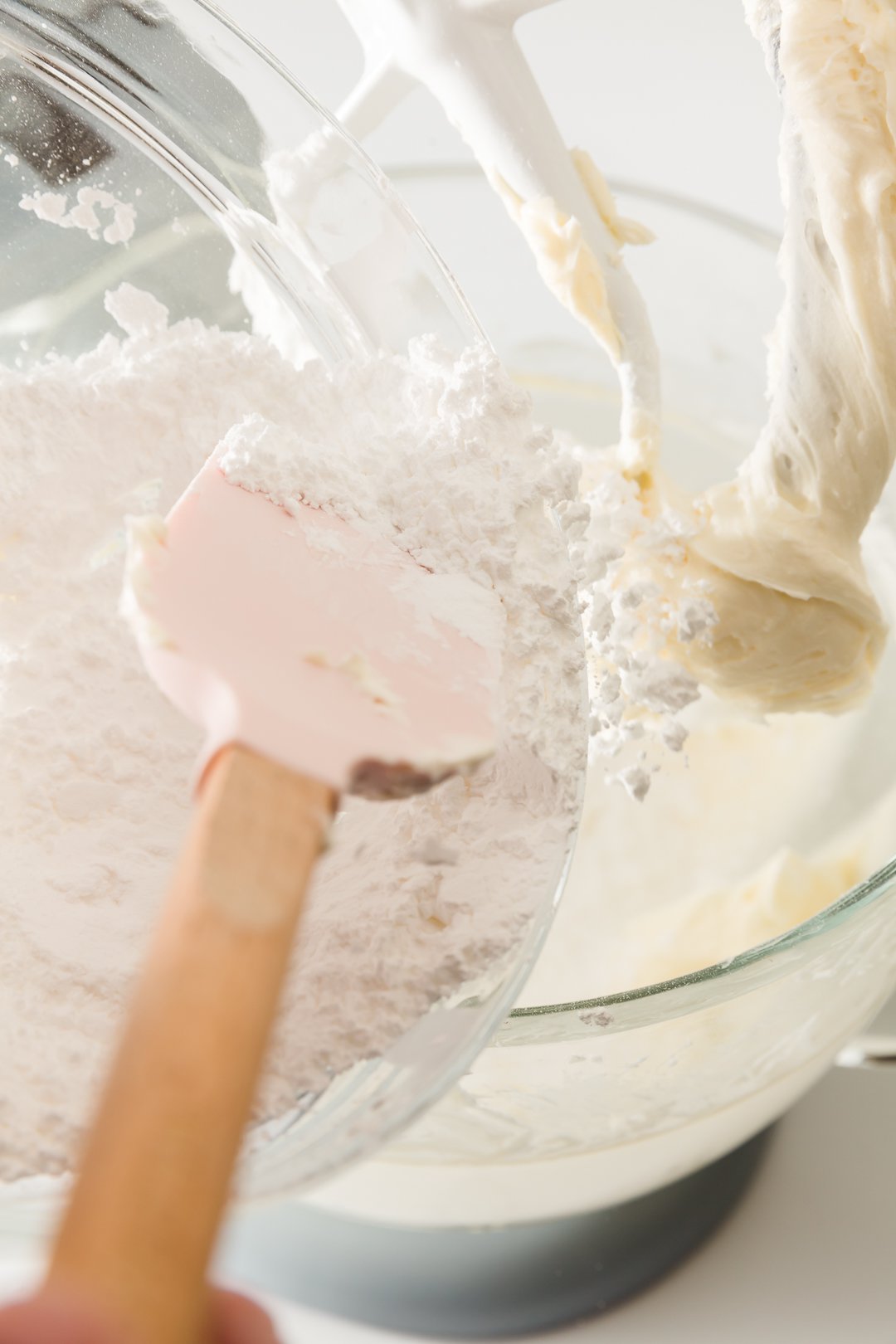 Adding powdered sugar to frosting recipe