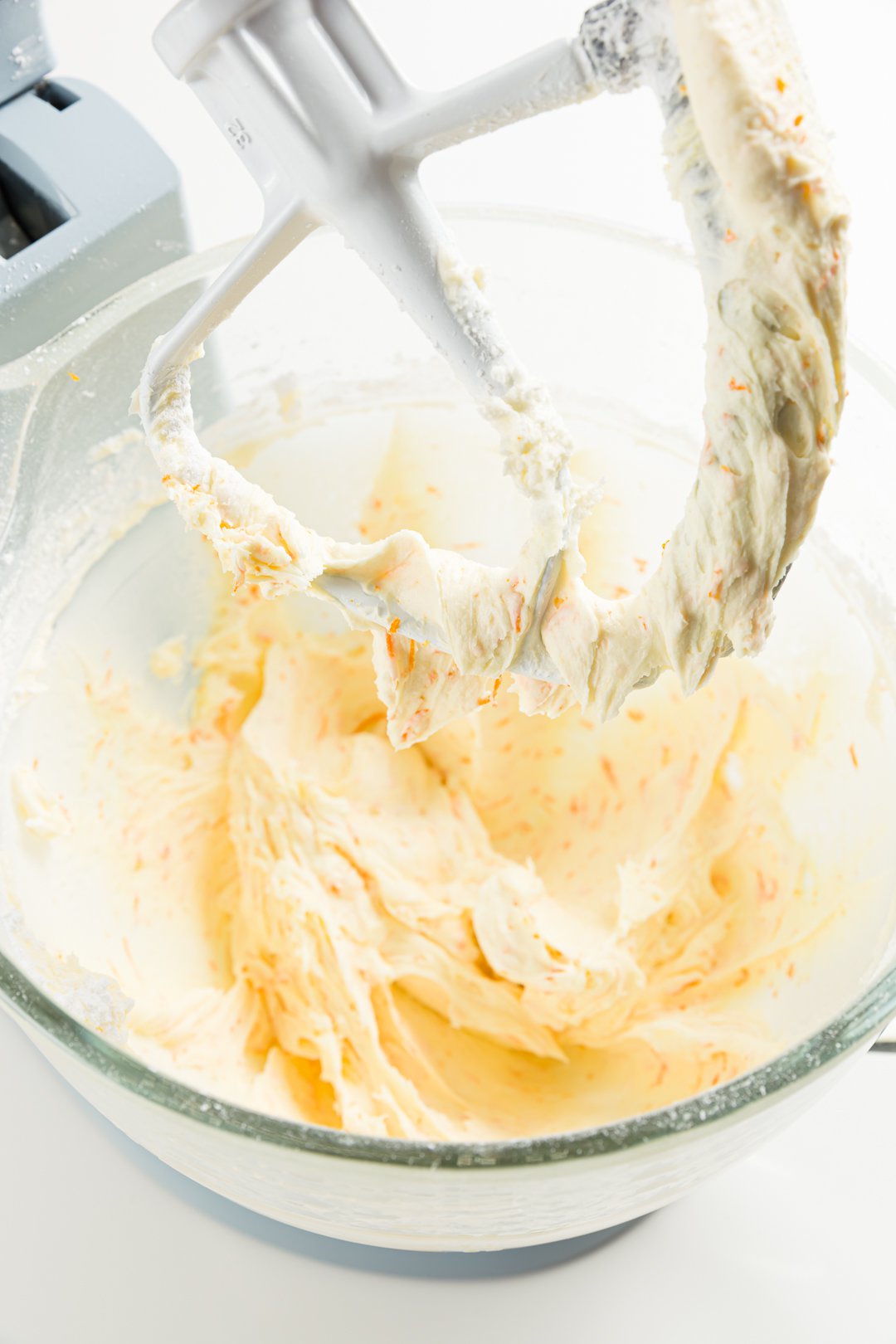 Orange buttercream in the mixing bowl