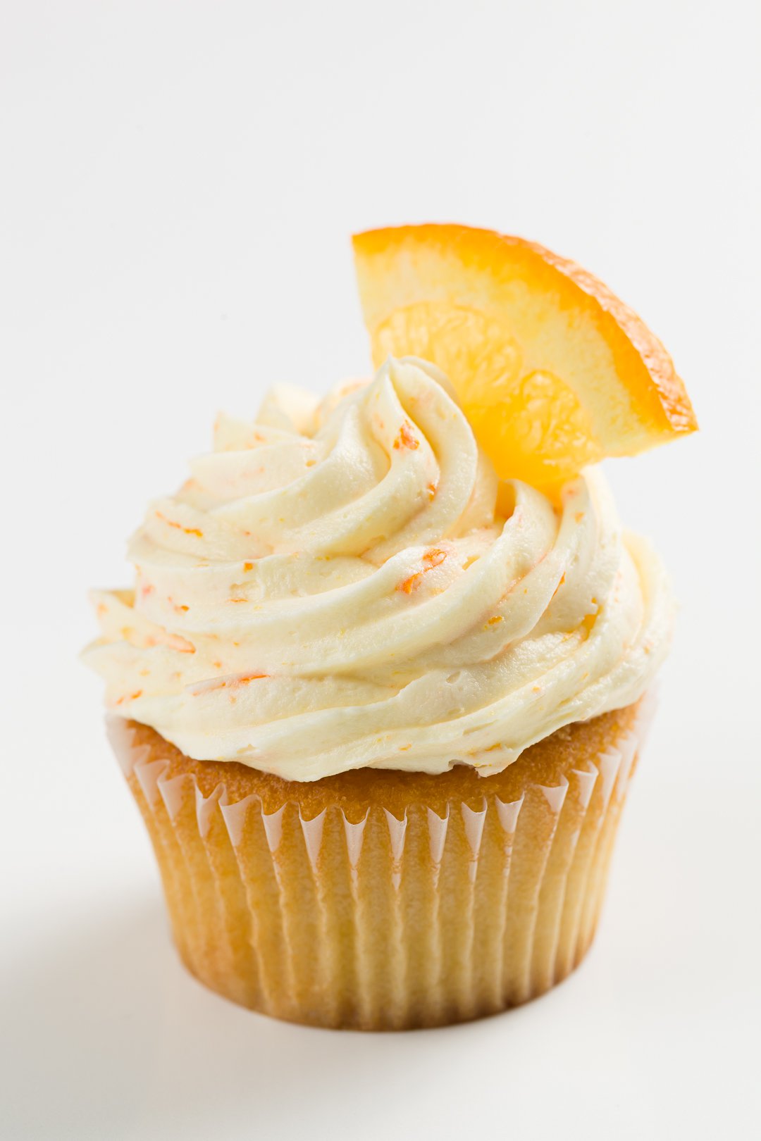 cupcake frosted with orange buttercream