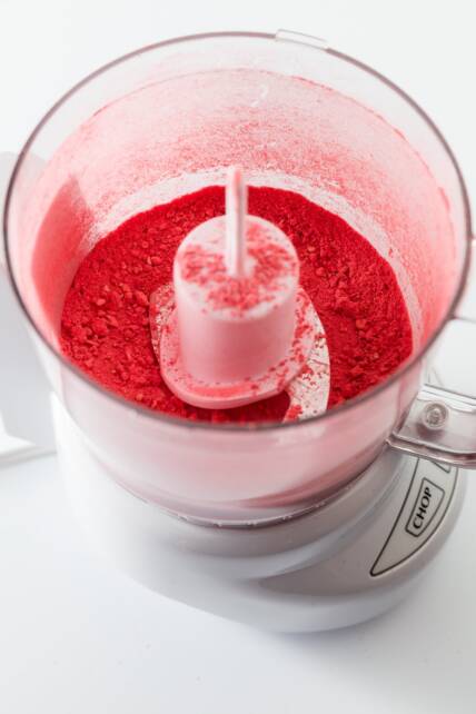 making strawberry powder in a food processor