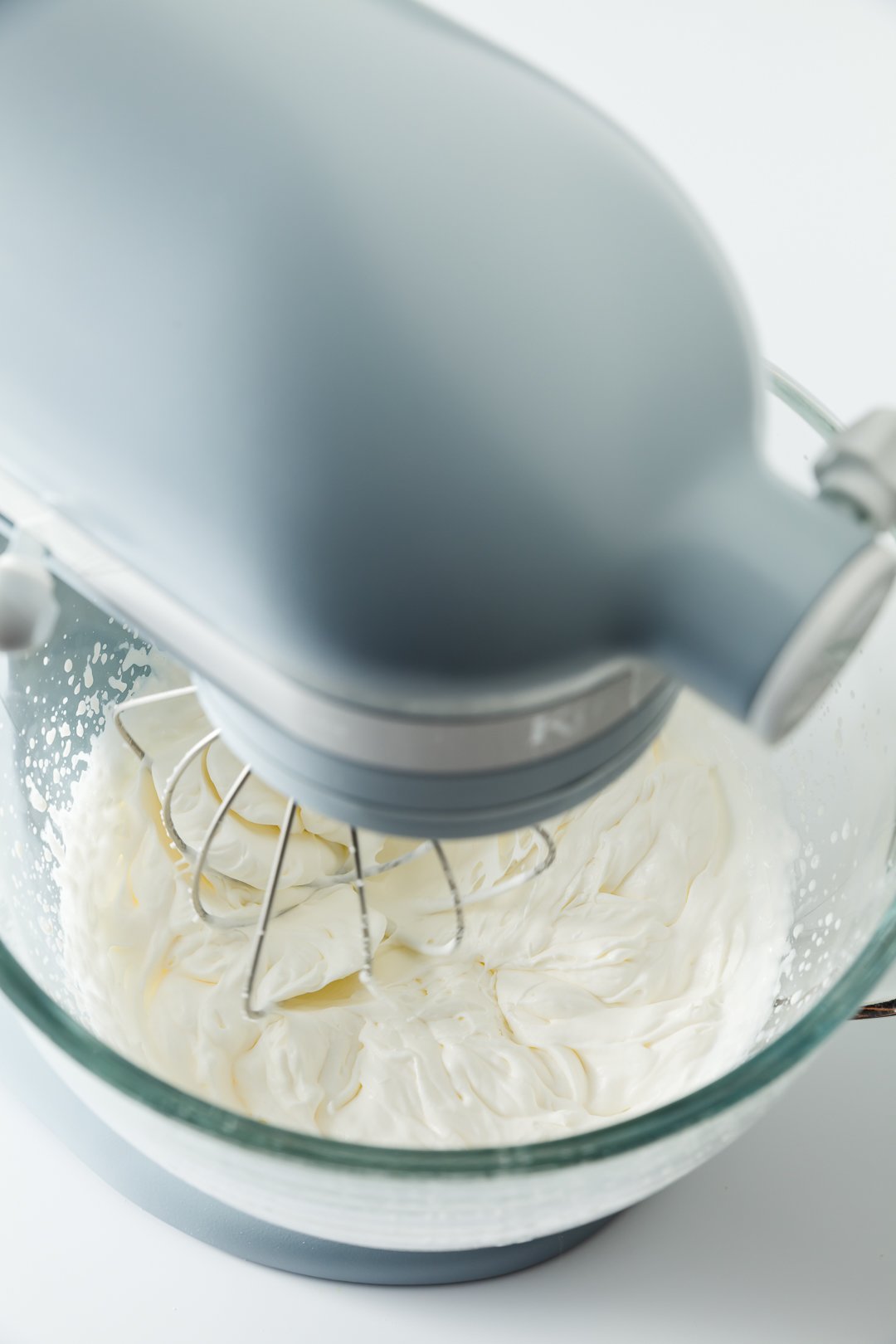 KitchenAid mixer filled with whipped cream