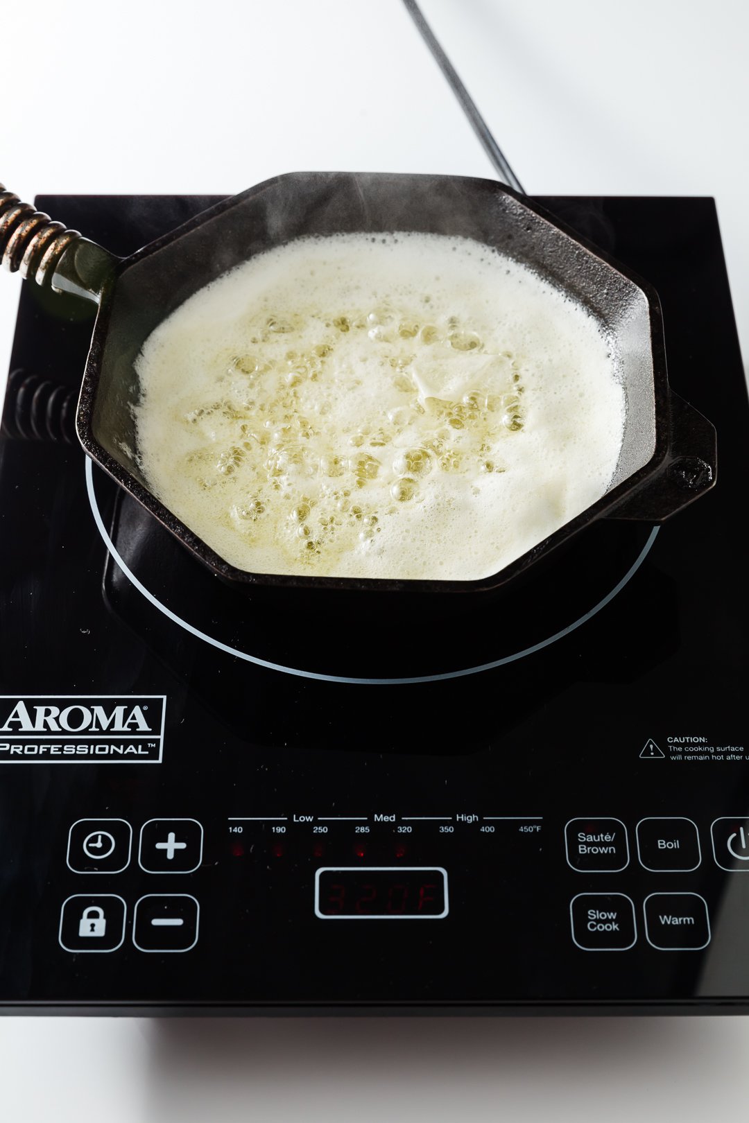 butter boiling in a skillet