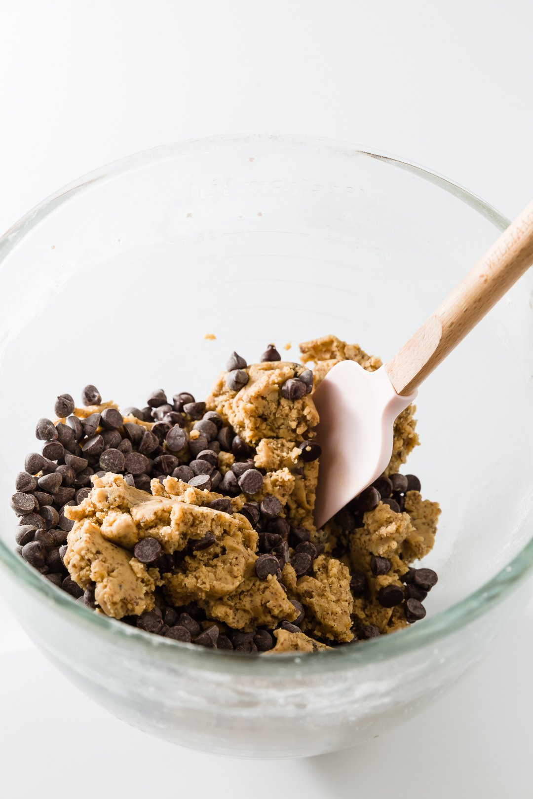 Mixing chocolate chips into dough