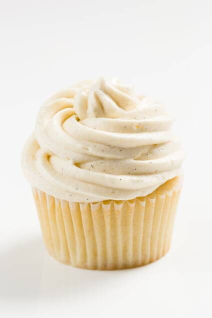Cupcake topped with sour cream frosting