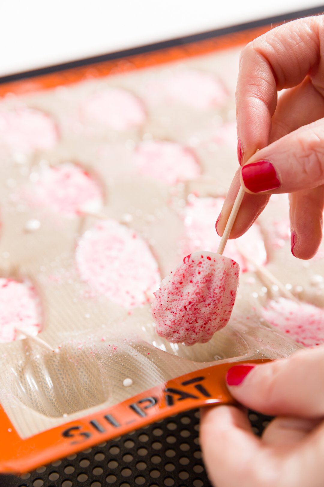Removing candy cane madeleine from the mold