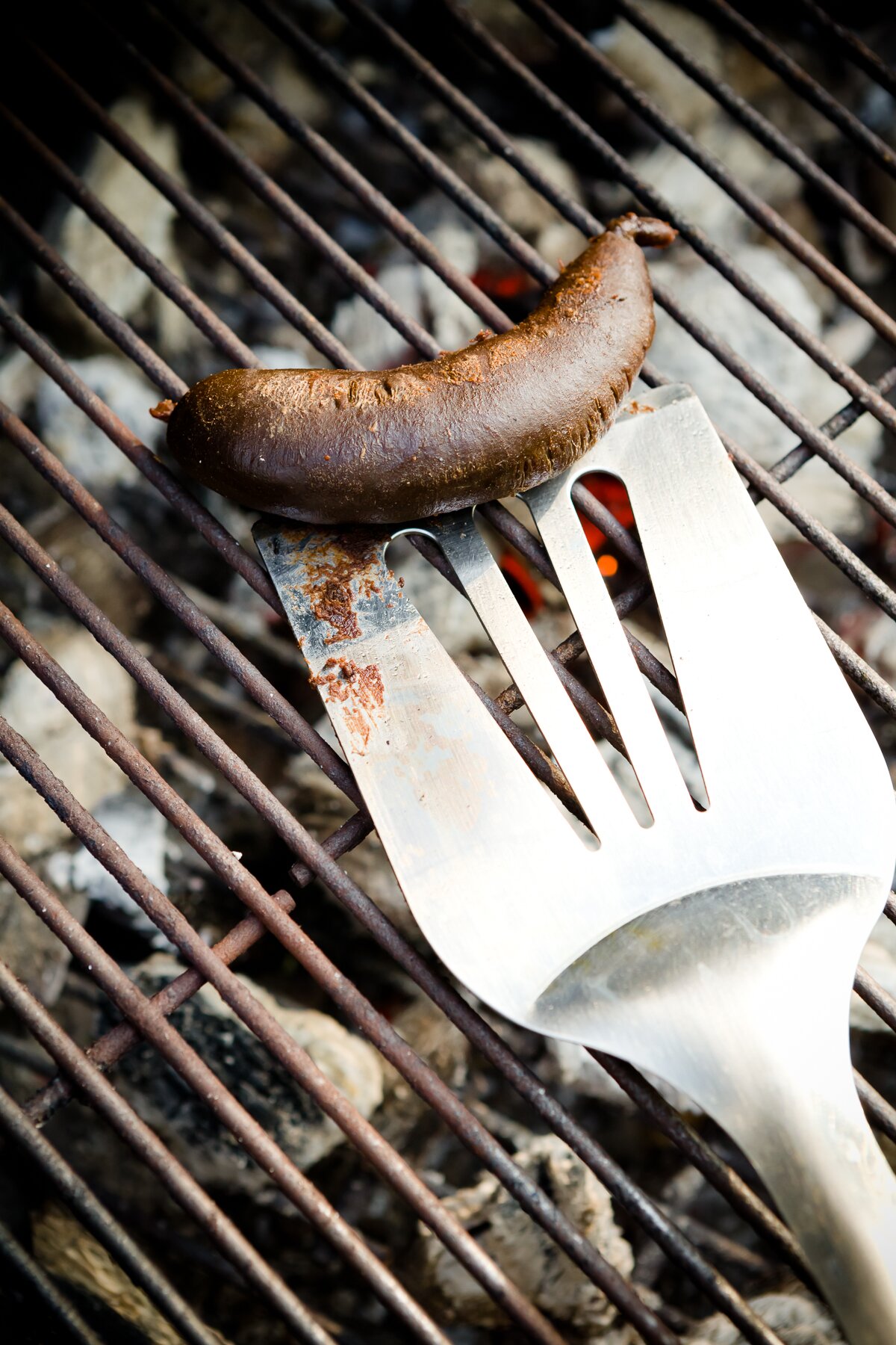 view of a dessert sausage being warmed on a BBQ grill
