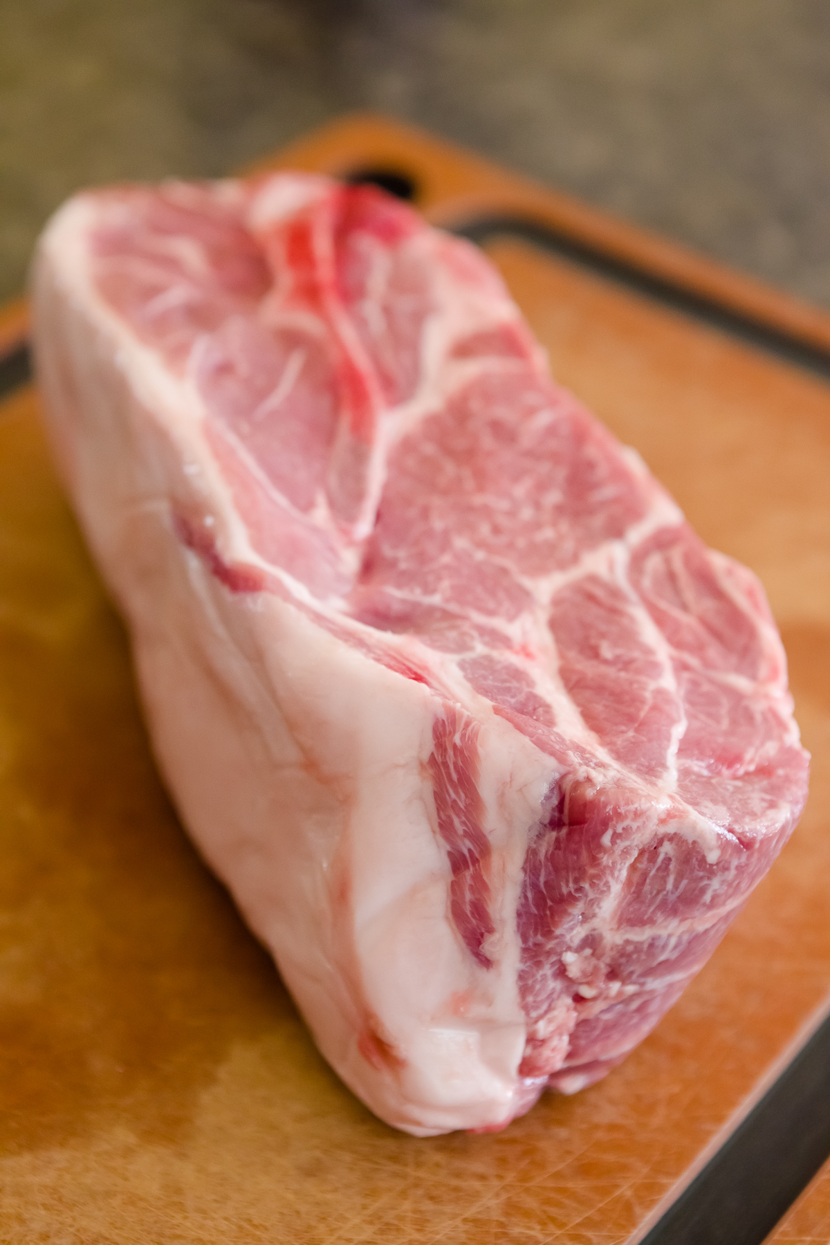 pork shoulder on a cutting board