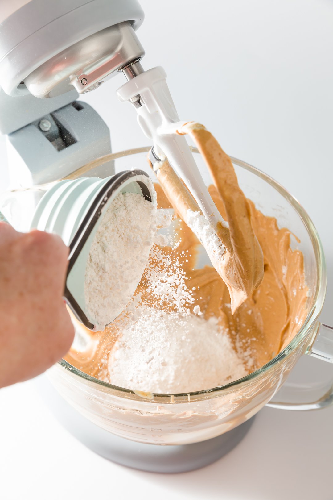 Adding powdered sugar to peanut butter frosting