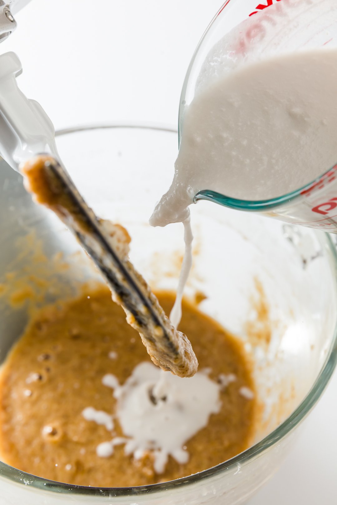 Adding coconut milk to the batter