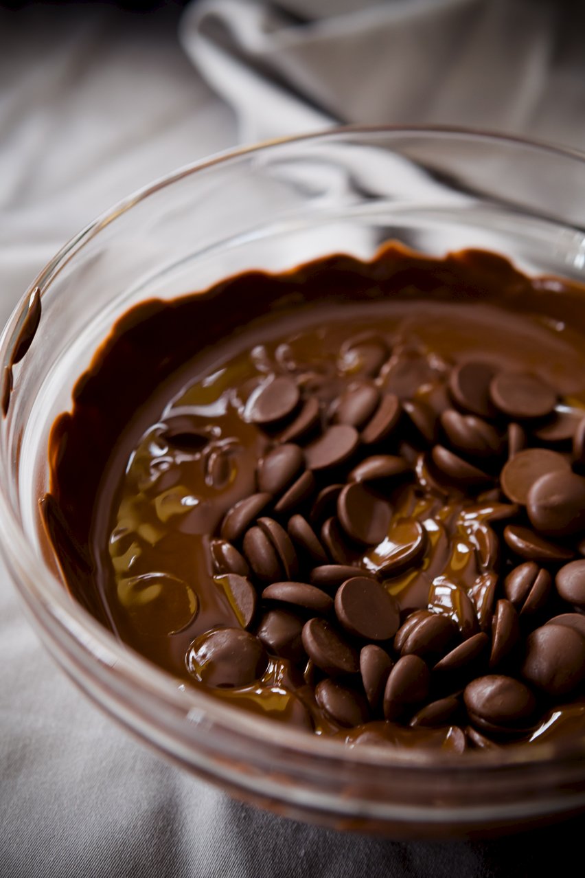 a bowl of partially melted chocolate chips