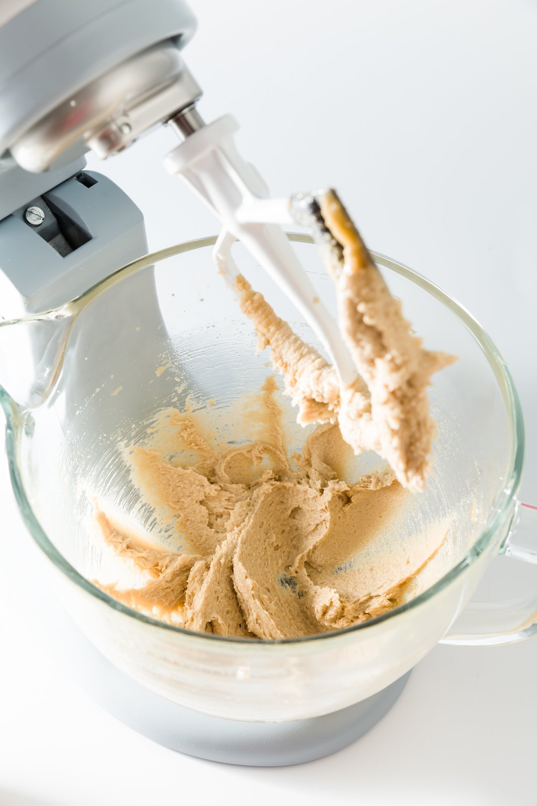 Brown sugar and butter mixed in a stand mixer