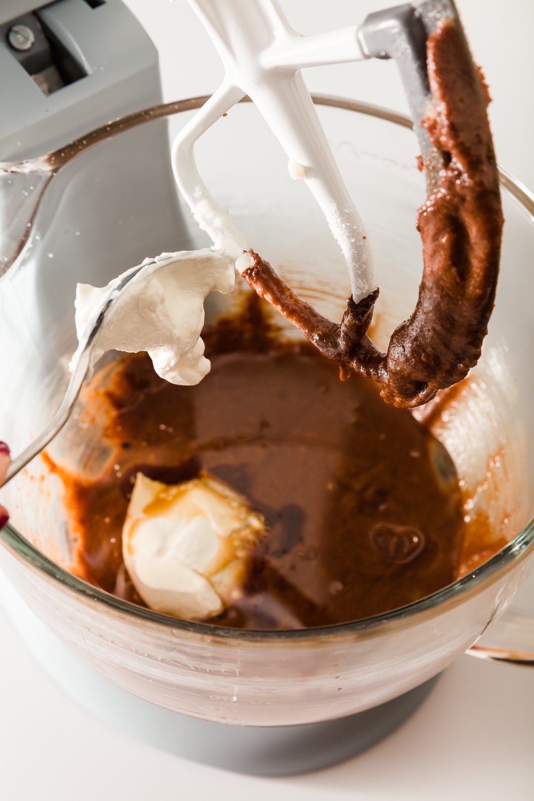 Adding sour cream to chocolate cupcake batter