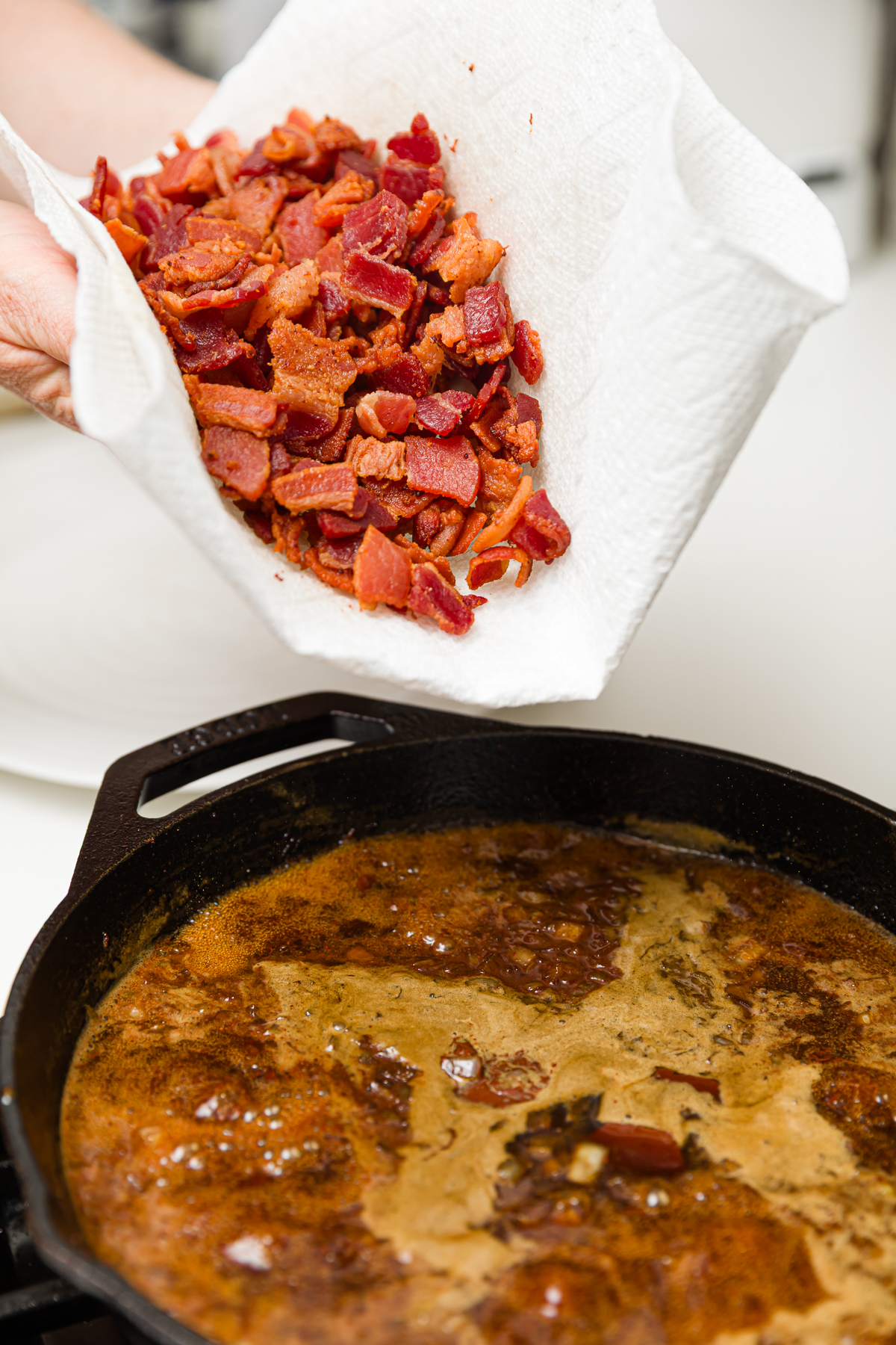 Adding bacon to the bacon jam