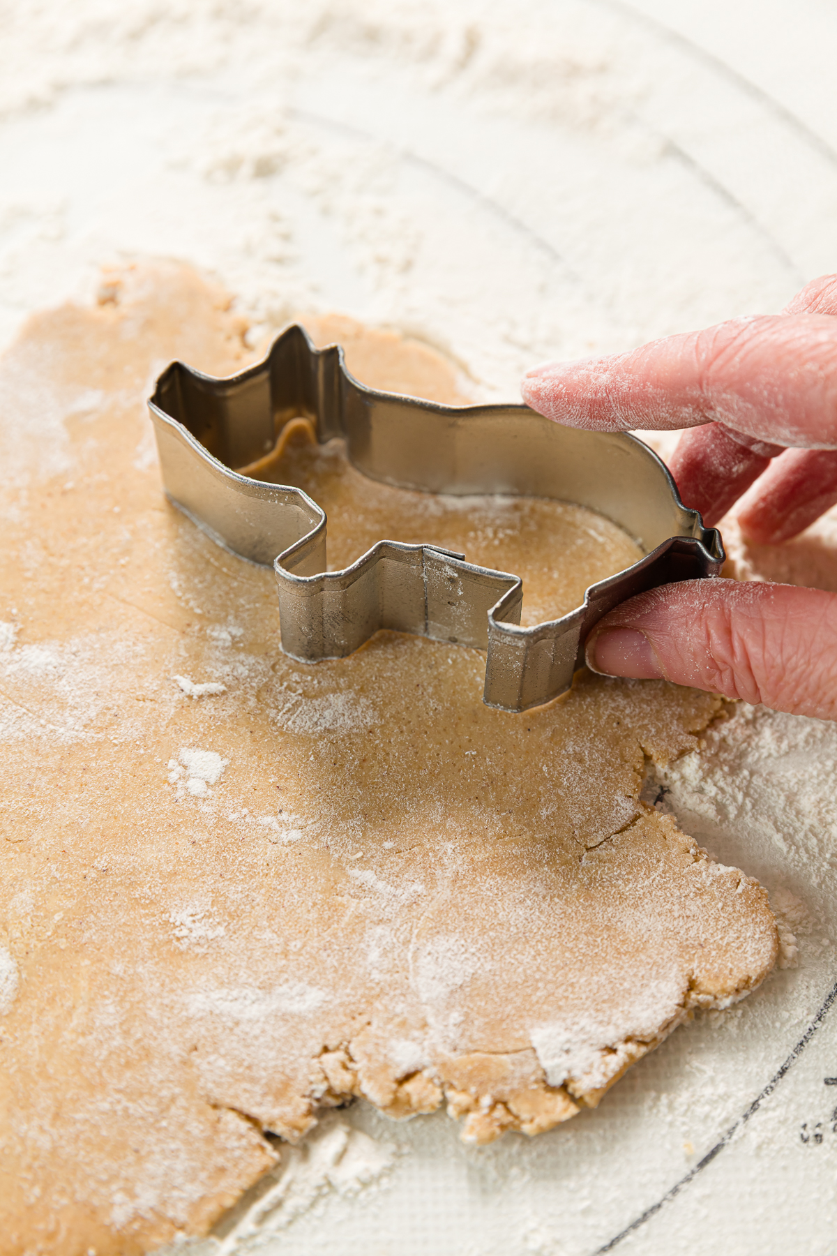 Cutting out a pig from dough