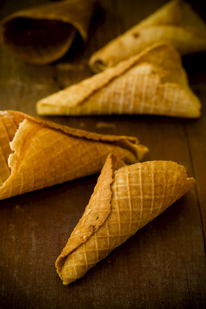 Several Waffle Cones on wood