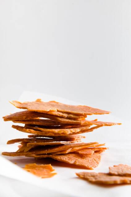 A stack of cheddar crisps