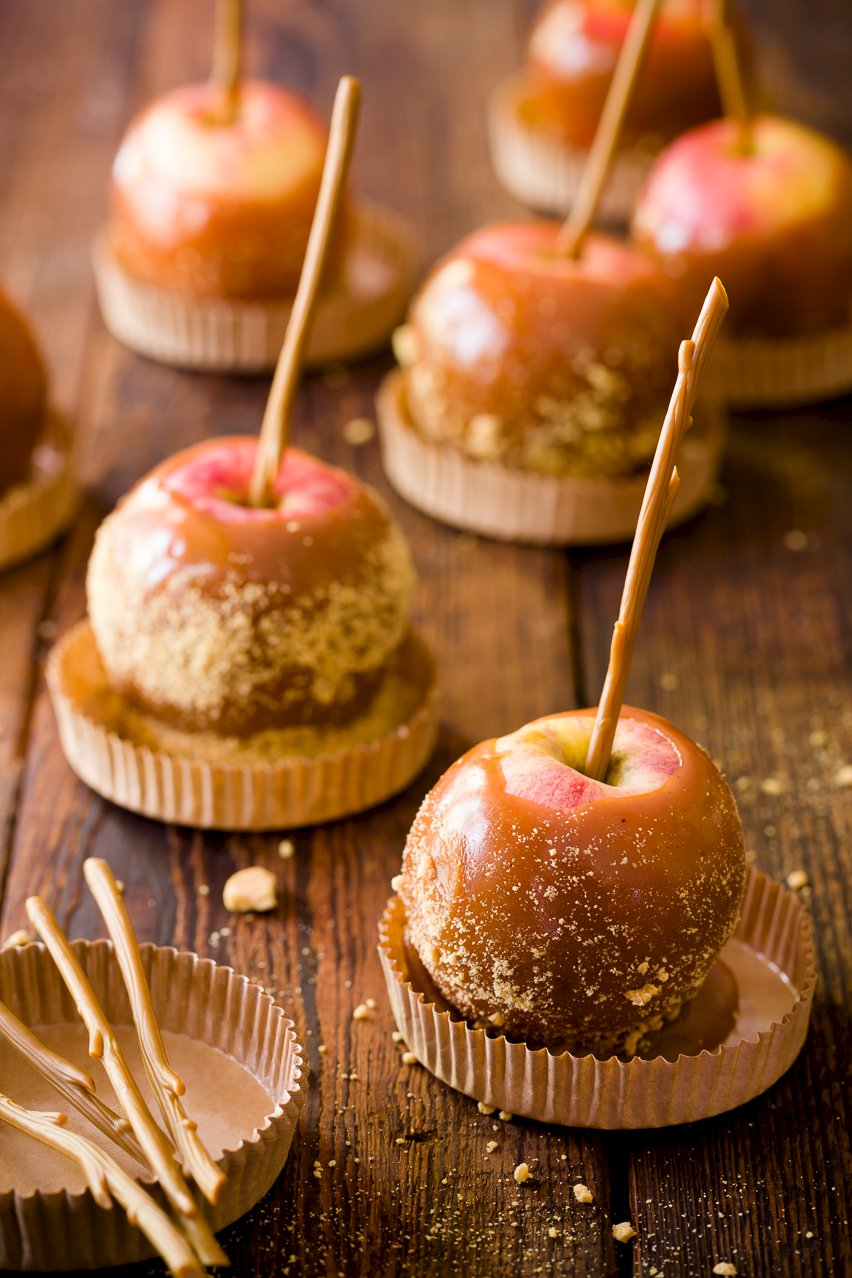 Caramel Apples on wood boards