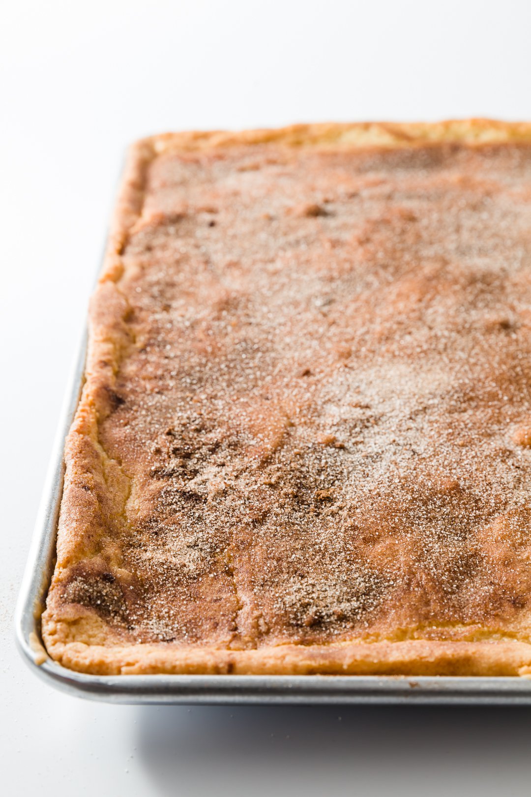 baked snickerdoodle bars in the pan