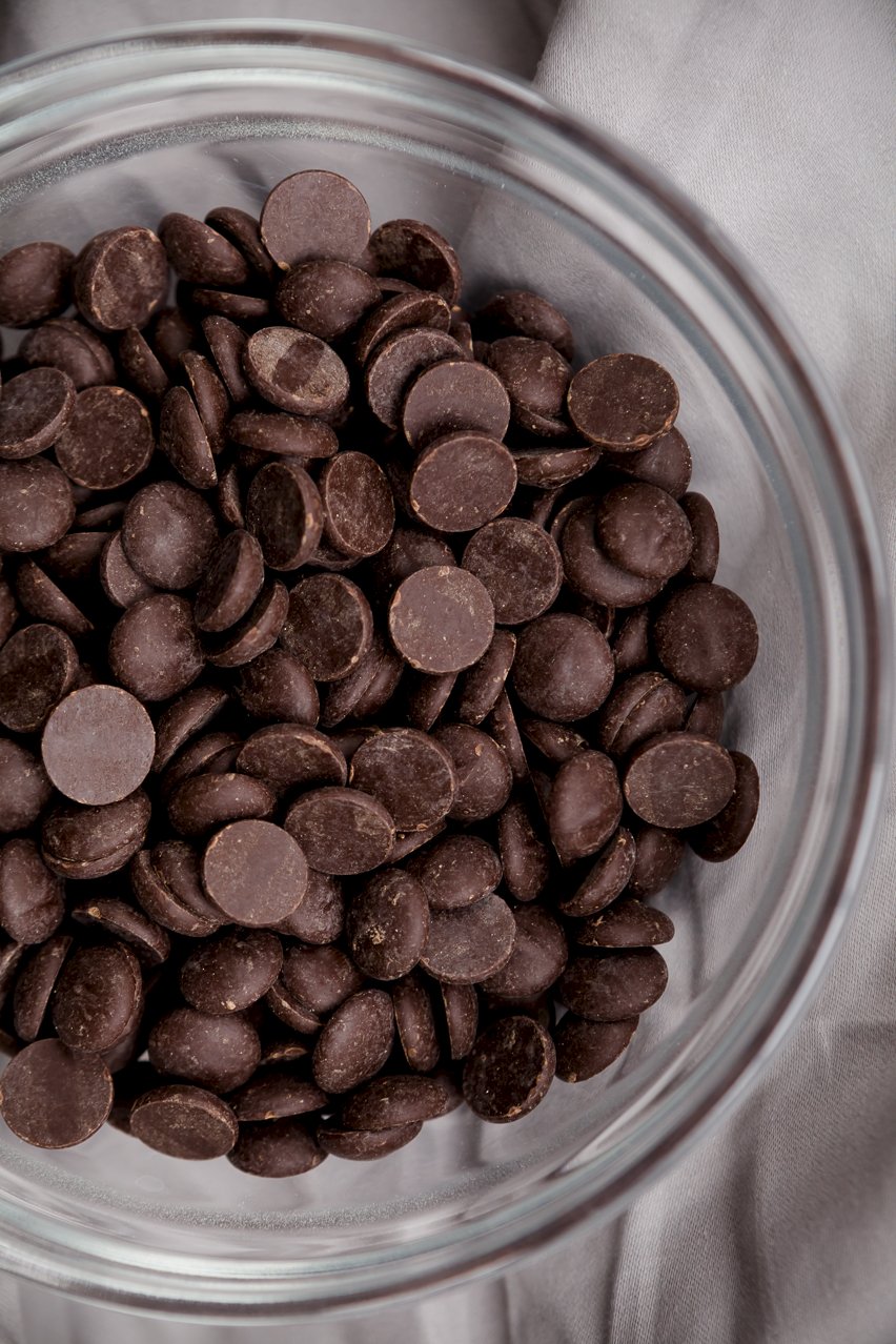 Chocolate chips in a glass bowl