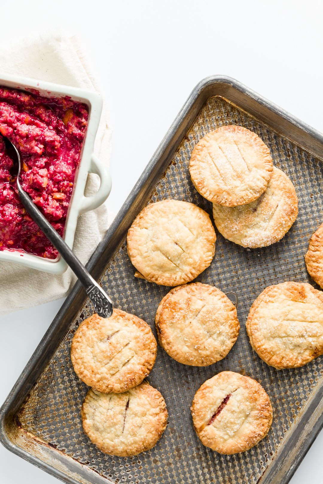 Cranberry Hand Pies on a cookie sheet