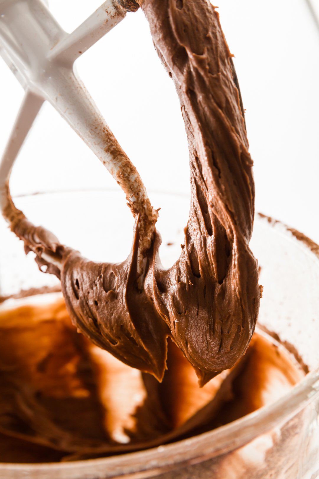 chocolate cream cheese frosting on a KitchenAid paddle