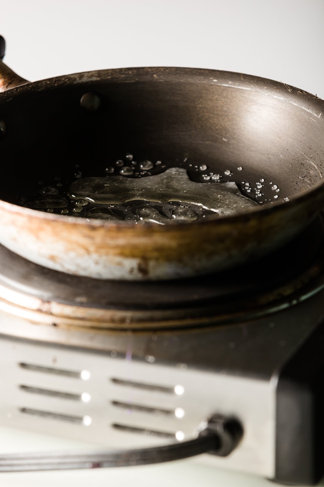 melted clear isomalt in a skillet
