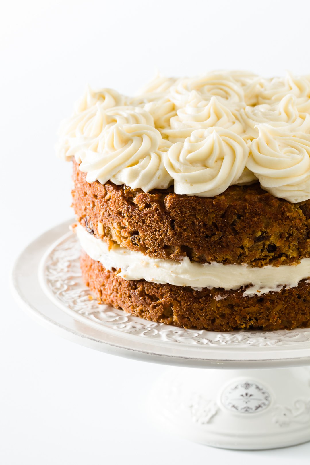 carrot cake topped with cream cheese frosting