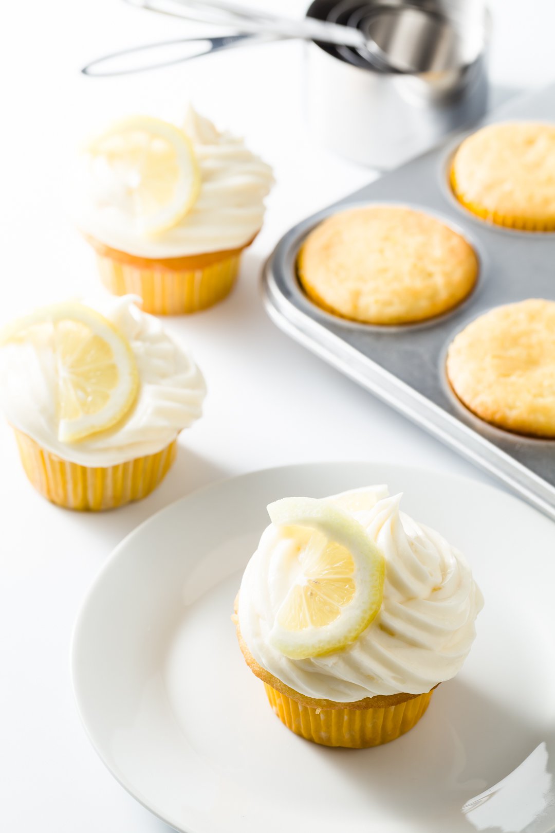 Lemon cream cheese frosting on lemon cupcakes