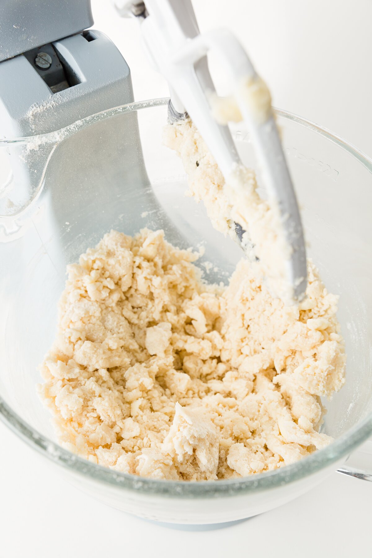 coconut milk thoroughly mixed with other ingredients in a stand mixer