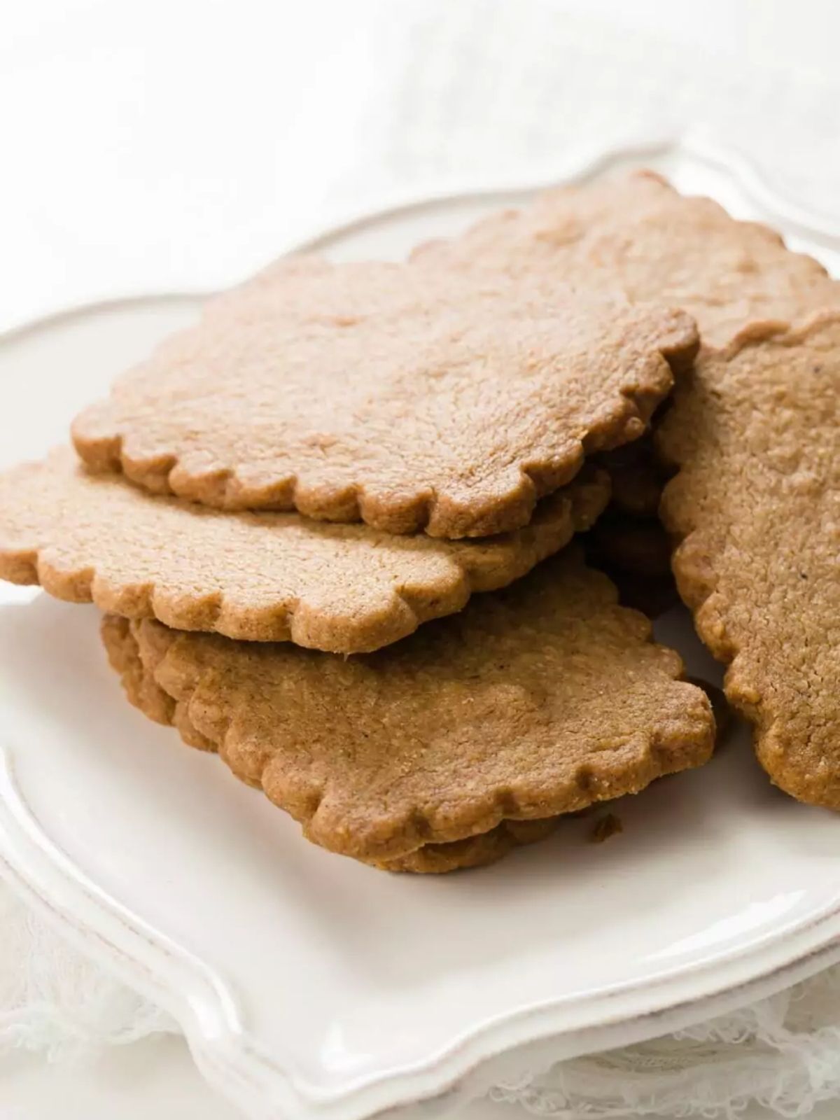 Biscoff cookies on a white plate.