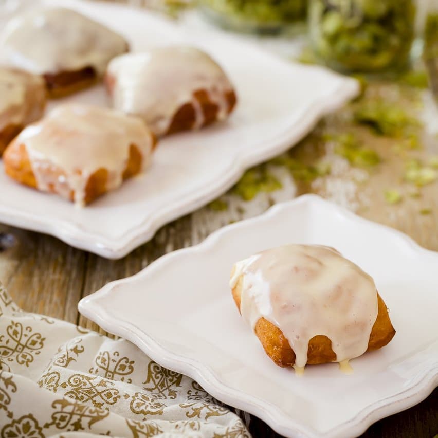 Gallery image for https://www.cupcakeproject.com/hops-donuts-with-lemon-curd-glaze/