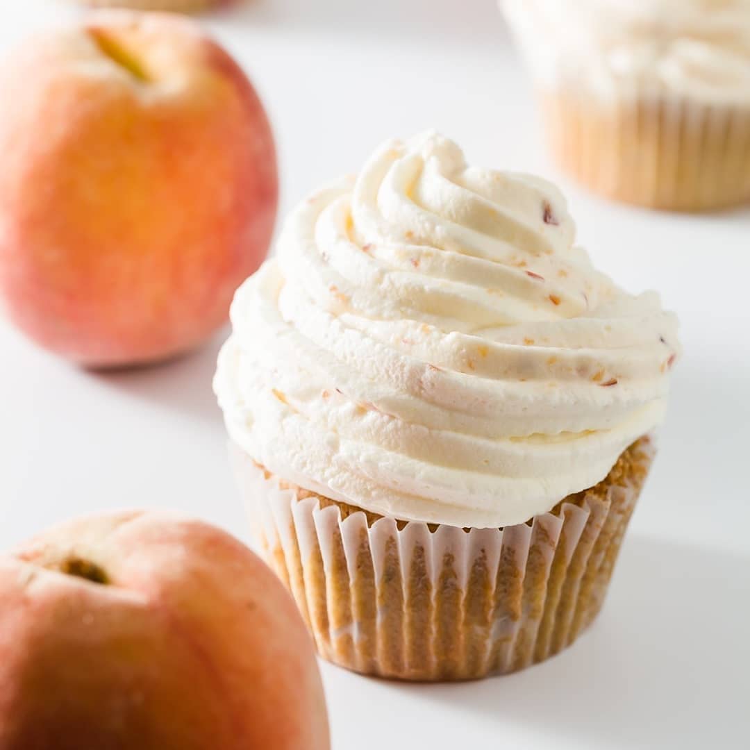Gallery image for https://www.cupcakeproject.com/whipped-cream-frosting-with-peaches/