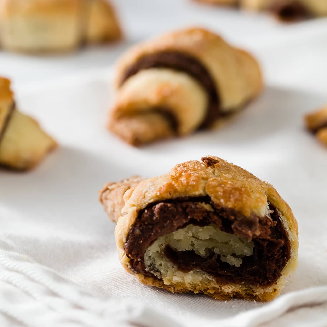 Gallery image for https://www.cupcakeproject.com/chocolate-cheesecake-rugelach/