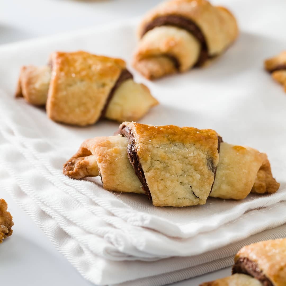 Gallery image for https://www.cupcakeproject.com/chocolate-cheesecake-rugelach/