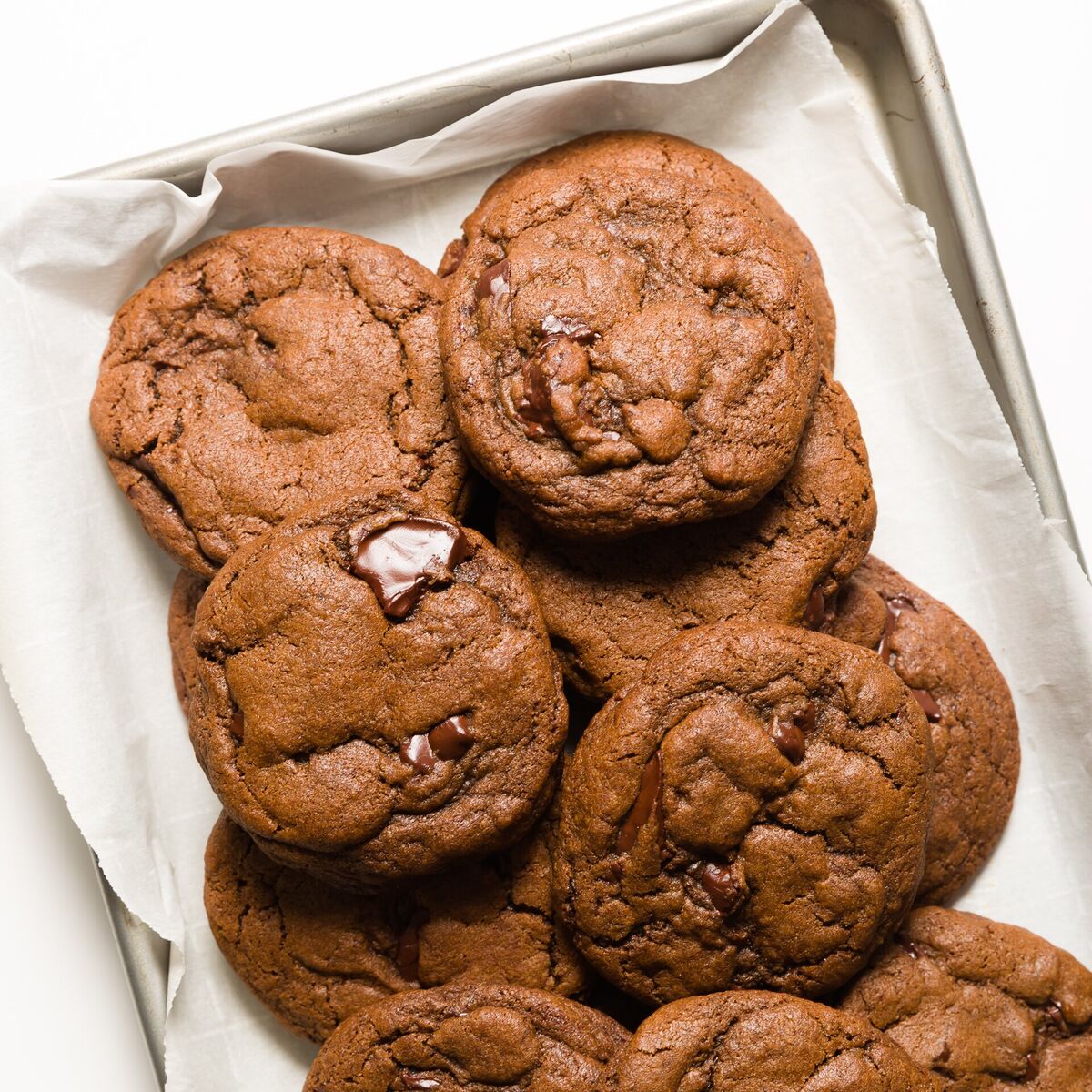 cookie sheet filled with chocolate cookies