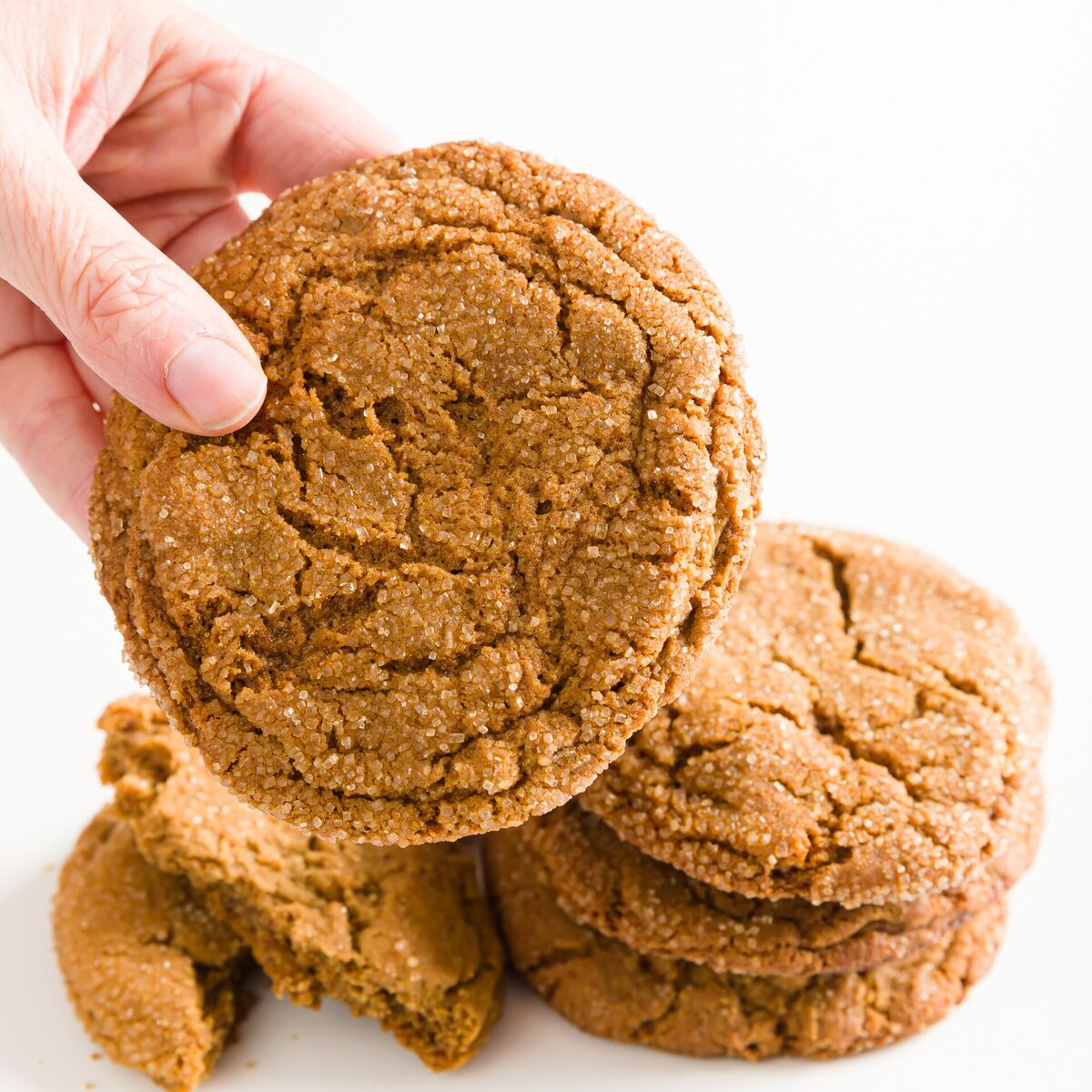 holding up a cookie