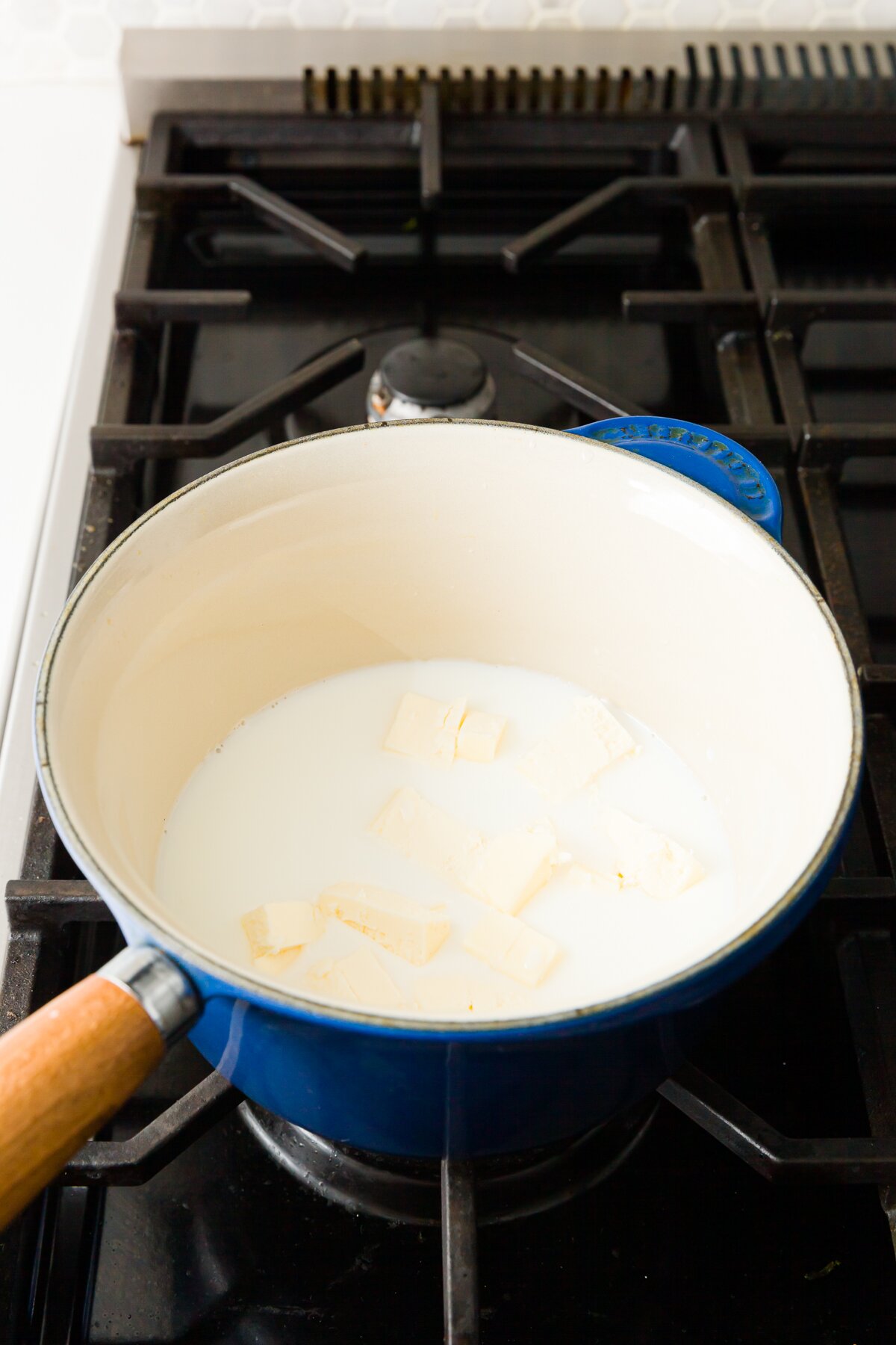 Pot on the stove with liquid and butter